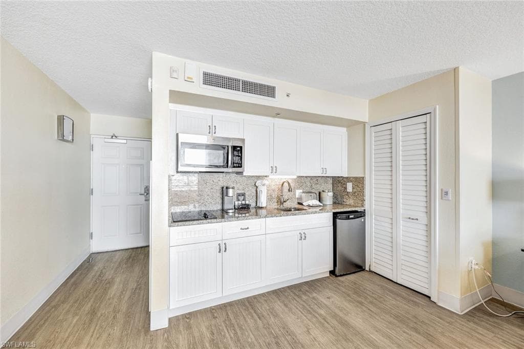 140 Estero BLVD 2105-11