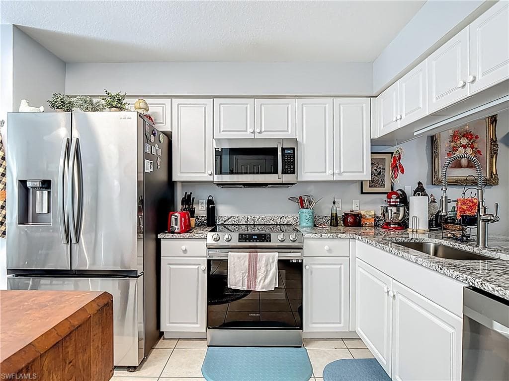 25735 LAKE AMELIA WAY 103-21