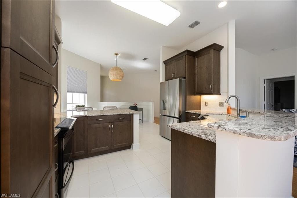 1144 Egrets Walk CIR 202-14