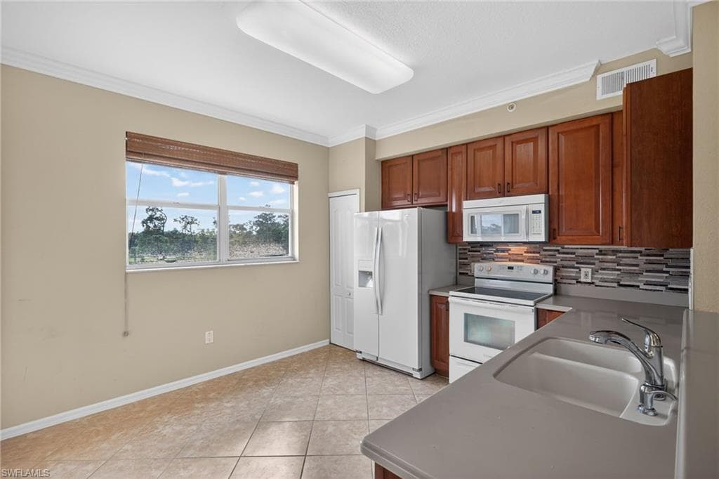 6816 STERLING GREENS PL 303-3