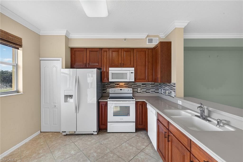 6816 STERLING GREENS PL 303-4