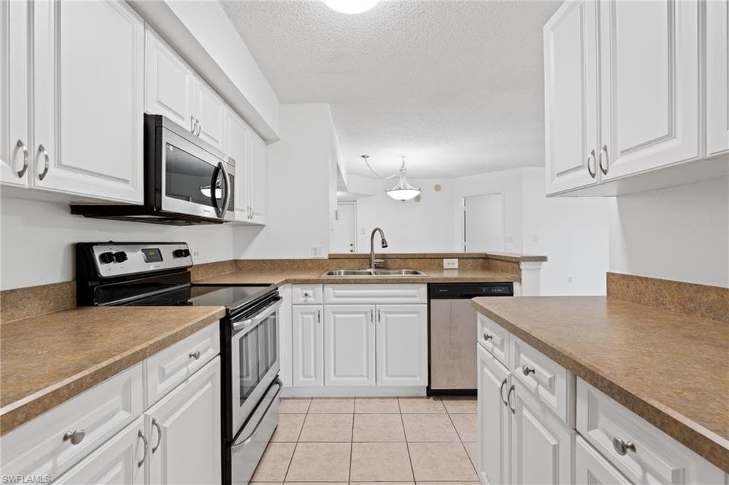 8940 Colonnades CT E 734-13