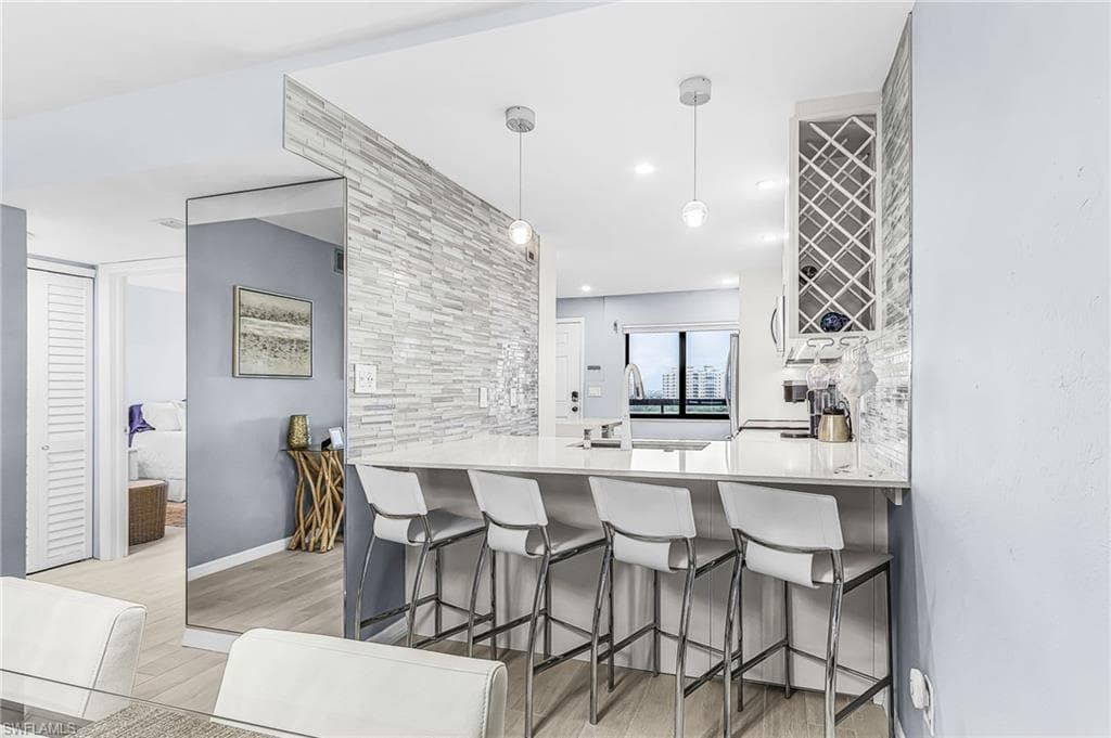 8402 Estero BLVD 704-6