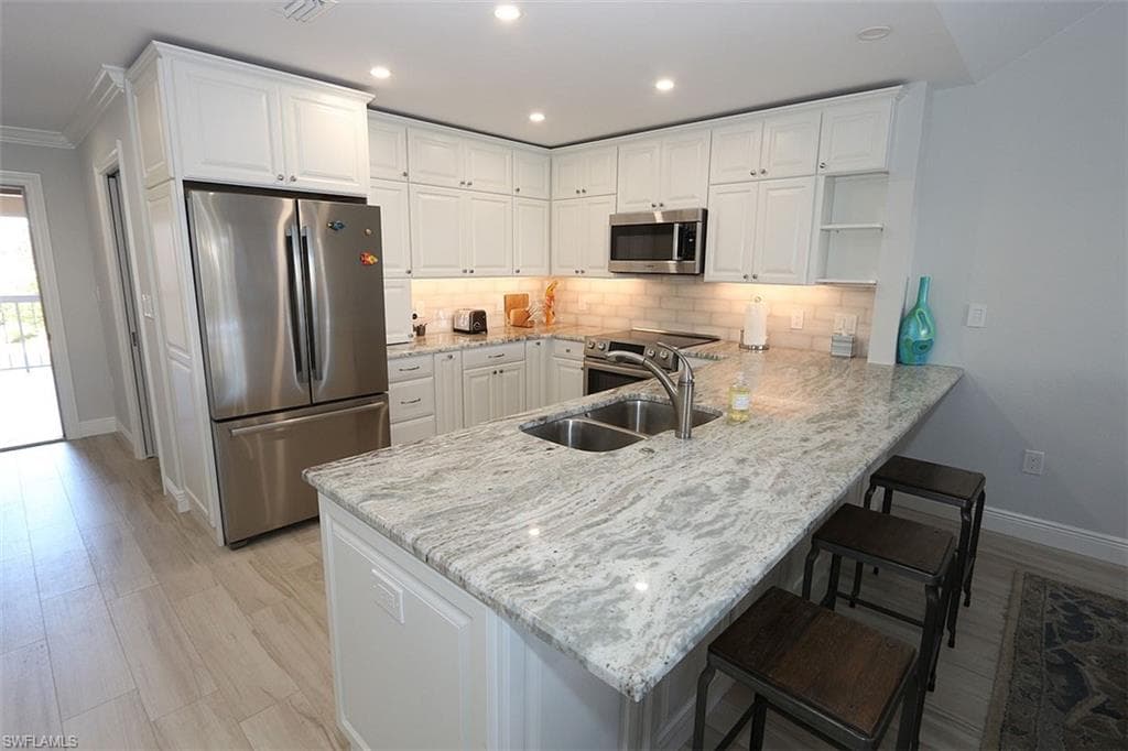 6131 Pelican Bay BLVD I4-14