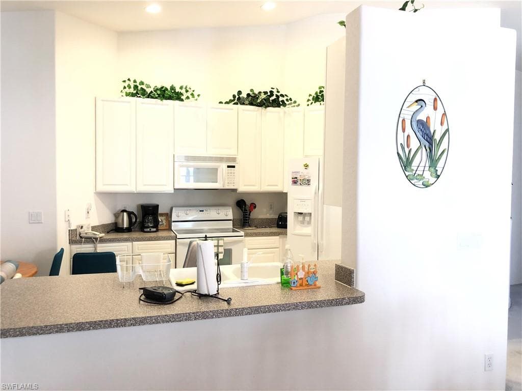 6854 STERLING GREENS DR 201-6