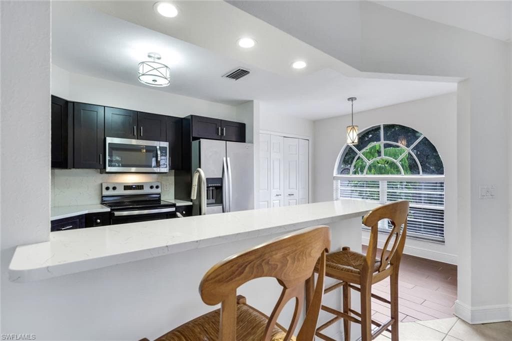 9624 CRESCENT GARDEN DR 201-5