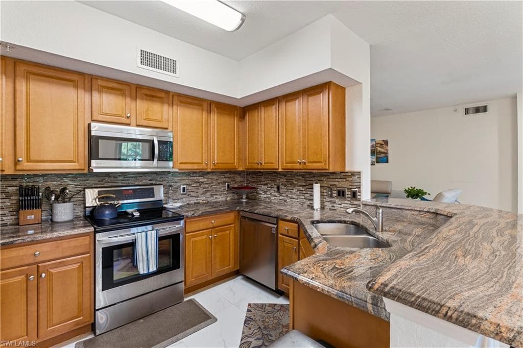 1190 Egrets Walk CIR 103-7