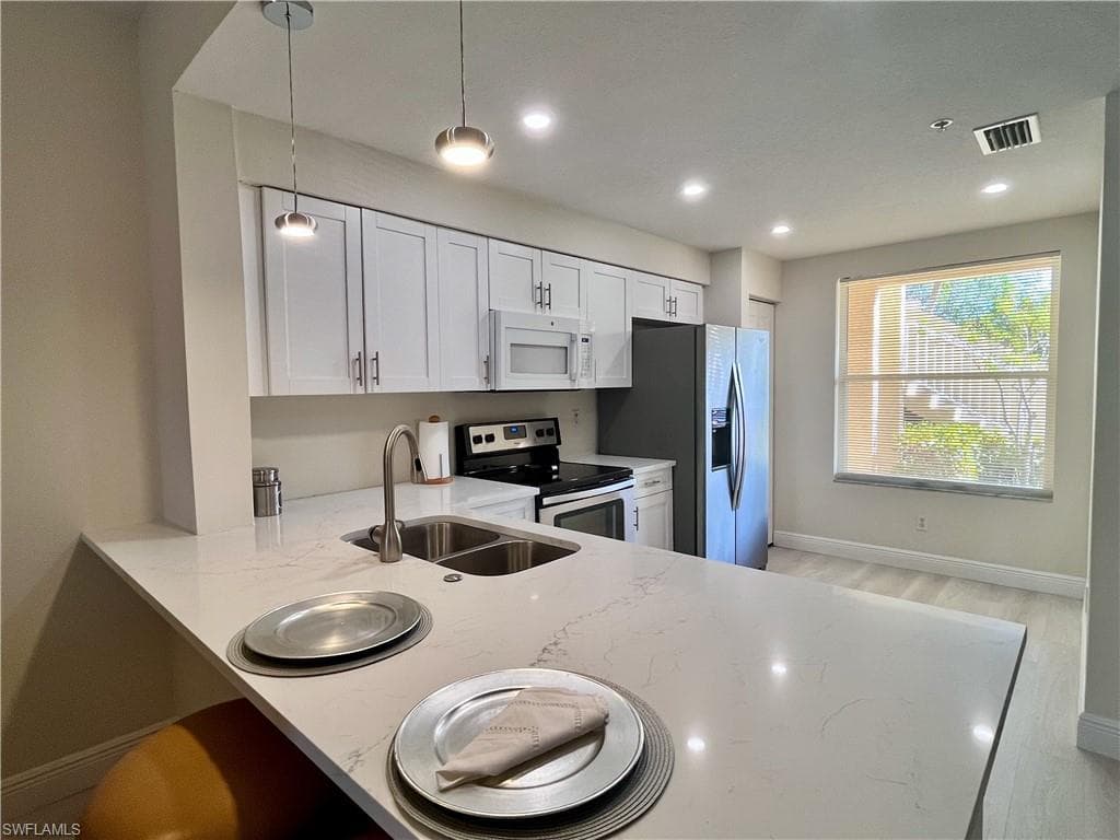 6920 Huntington Lakes CIR 103-2